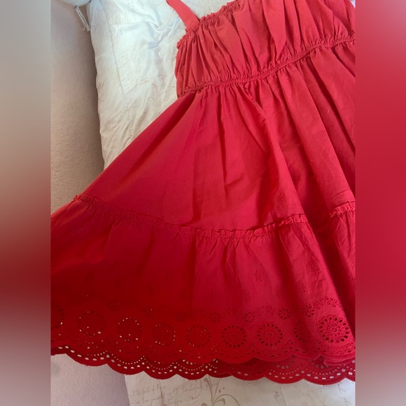 Red dress with designs on bottom and some at top - Picture 4 of 4